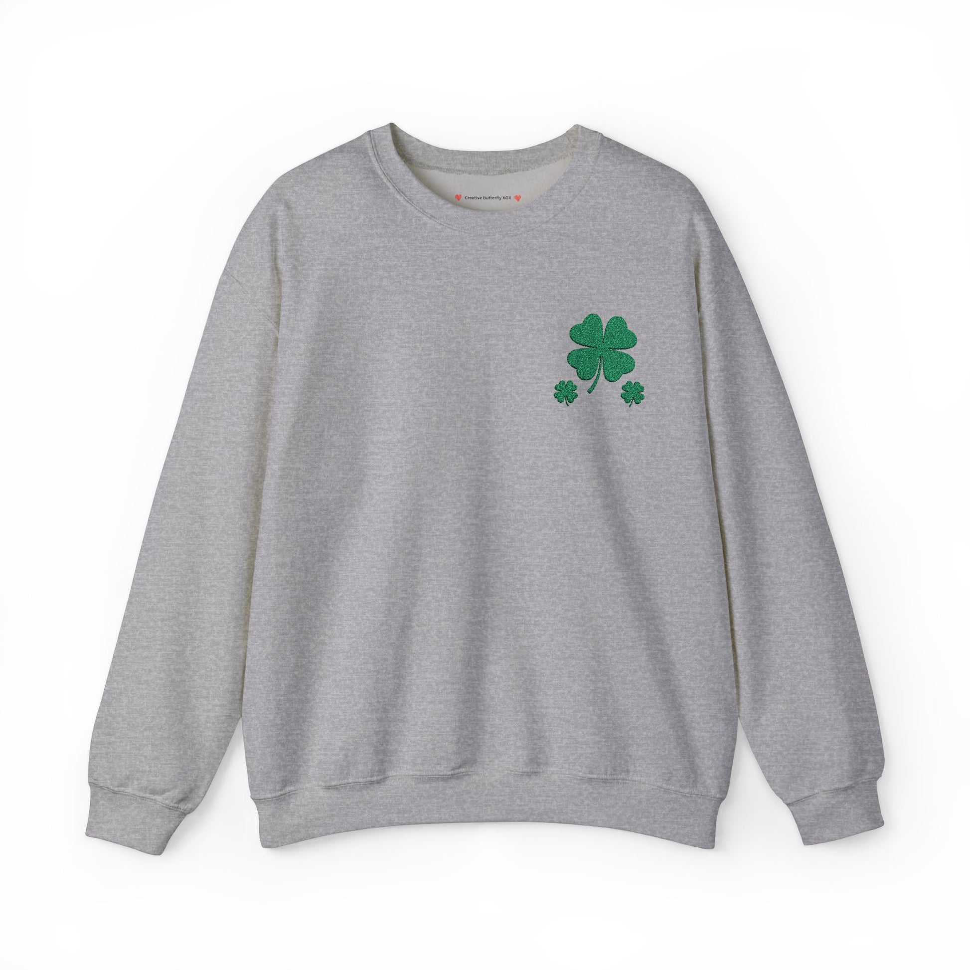 Cozy grey sweatshirt crewneck with an embroidered four-leaf clover for a festive look