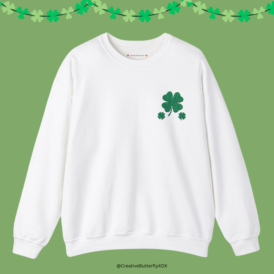 Green shamrock crewneck sweater with embroidered lucky clover design on white pullover, St. Paddy's day fashion