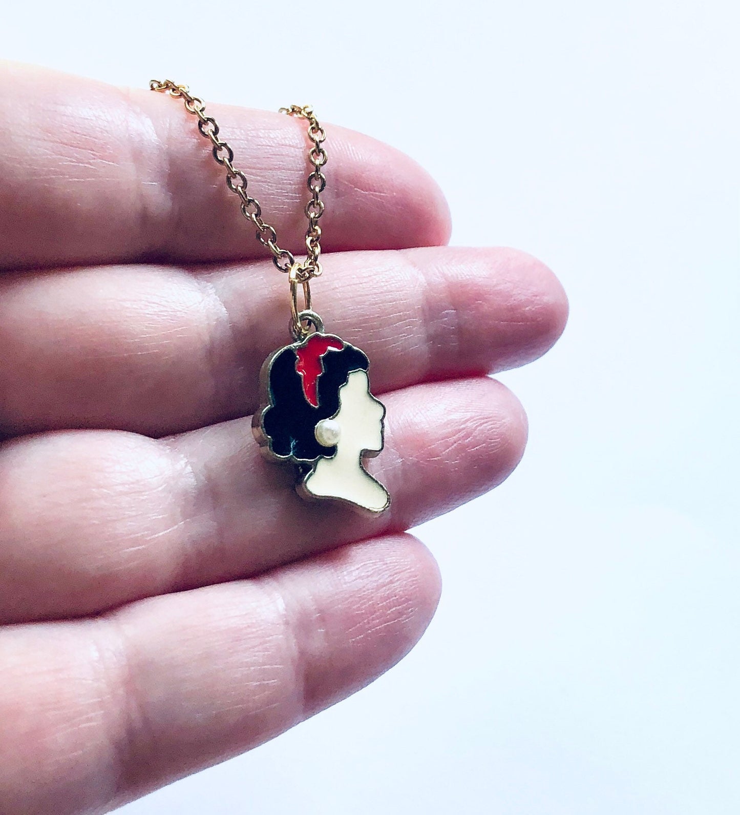 Snow White Necklace, Gold Lady Necklace, Gold Plated Over Stainless Steel, Lady Wearing Pearl Stud Earrings, Enamel Charm