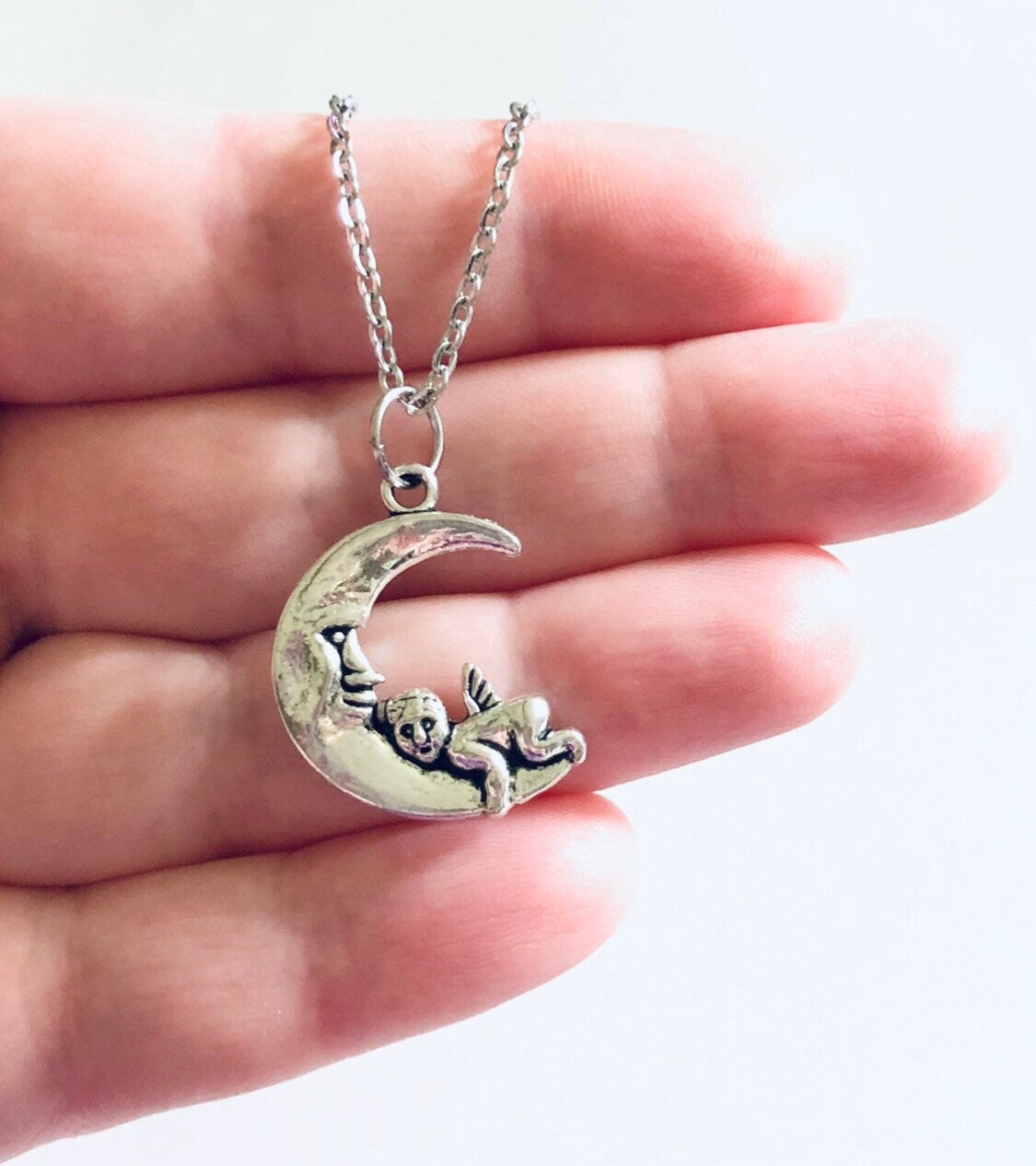 Silver Cherub Moon Necklace, Dainty Chain with Angel Charm on Crescent Moon Celestial Wicca Witchy Woman