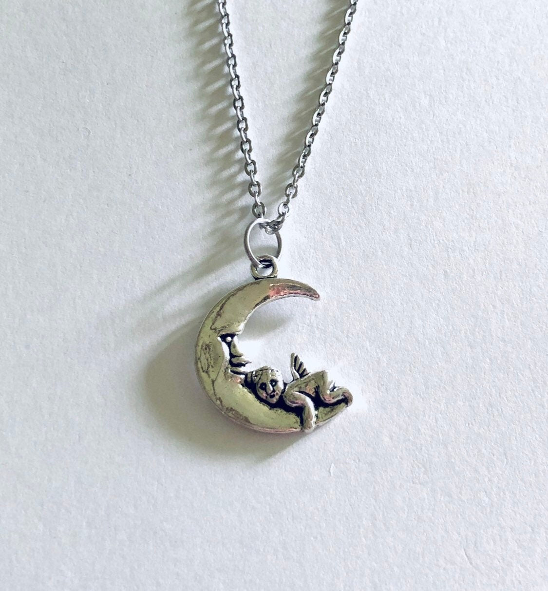 Silver Cherub Moon Necklace, Dainty Chain with Angel Charm on Crescent Moon Celestial Wicca Witchy Woman