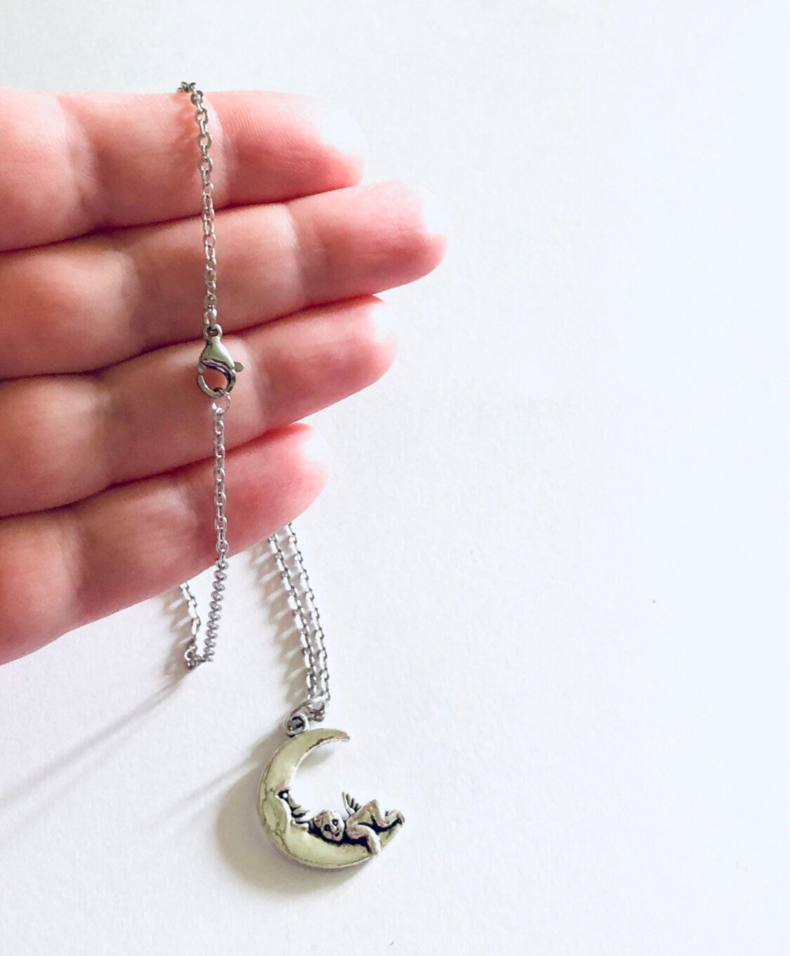 Silver Cherub Moon Necklace, Dainty Chain with Angel Charm on Crescent Moon Celestial Wicca Witchy Woman